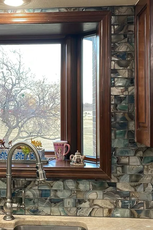 glass tile installation in kitchen window 
